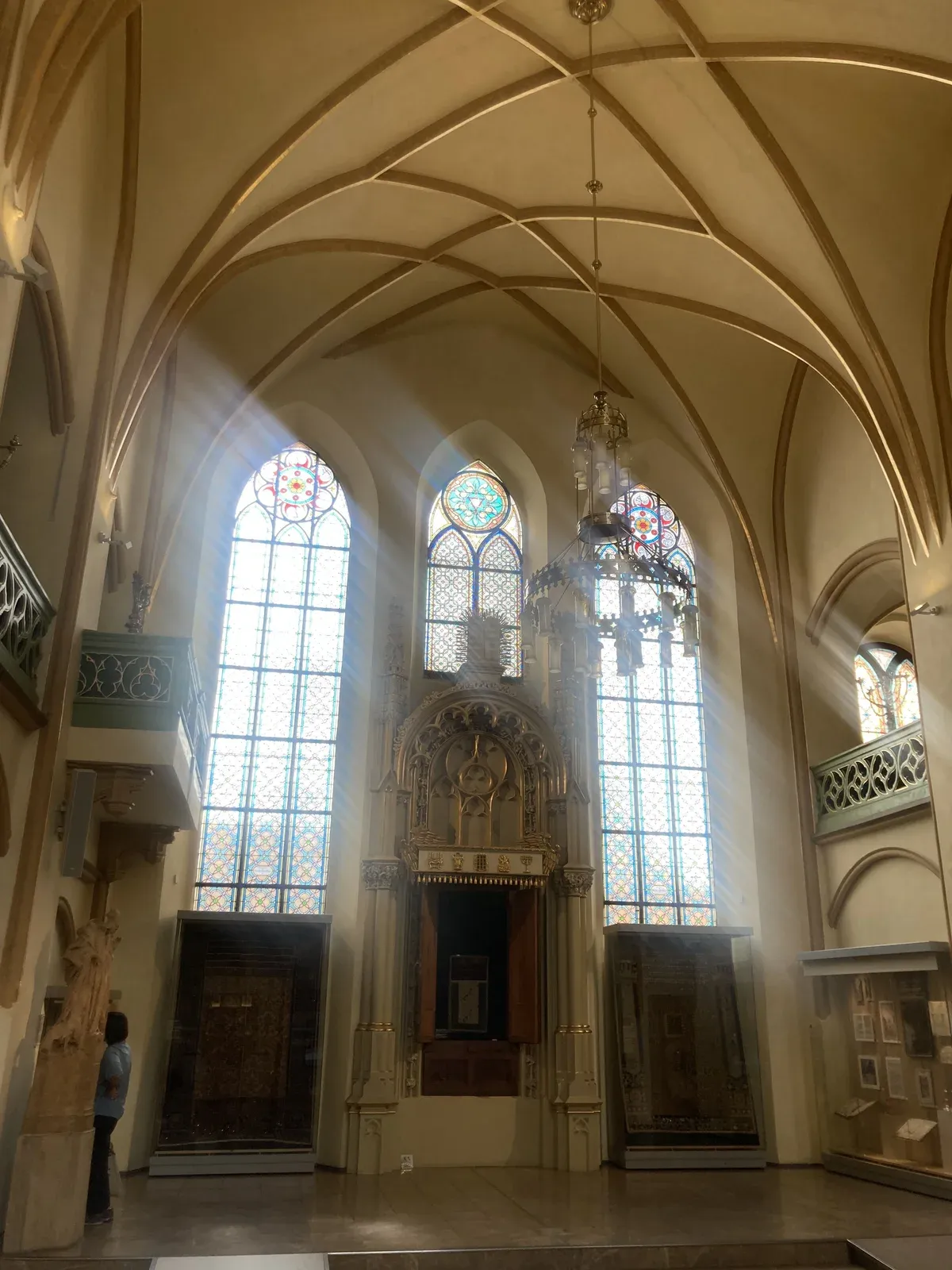 Light through the tall windows of the Maisel Synagogue interior on a Prague Jewish Quarter tour