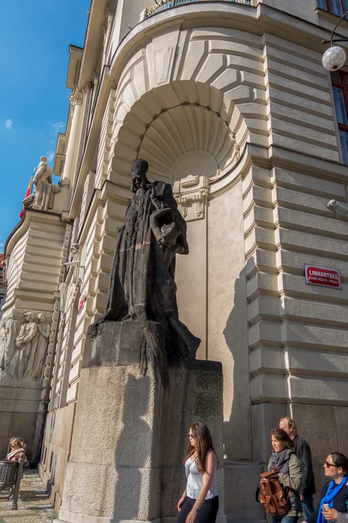 Statue of Rabbi Loew on the New Town Hall, a Golem legend stop on Prague Jewish Quarter tours