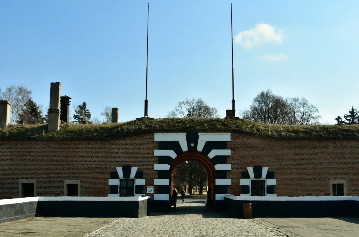 Striped gate of the Small Fortress on a Terezin tour from Prague